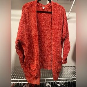 soft red cardigan with pockets
